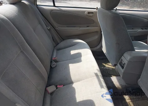 2001 Toyota Corolla Le из США, поврежденный, VIN 2T1BR12E81C451844